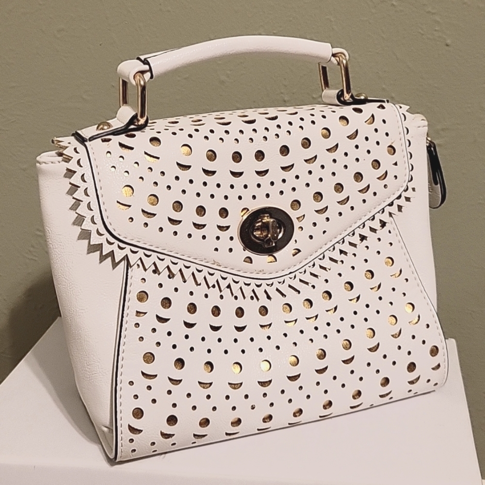 Melie Bianco Sophia laser cut top handle bag